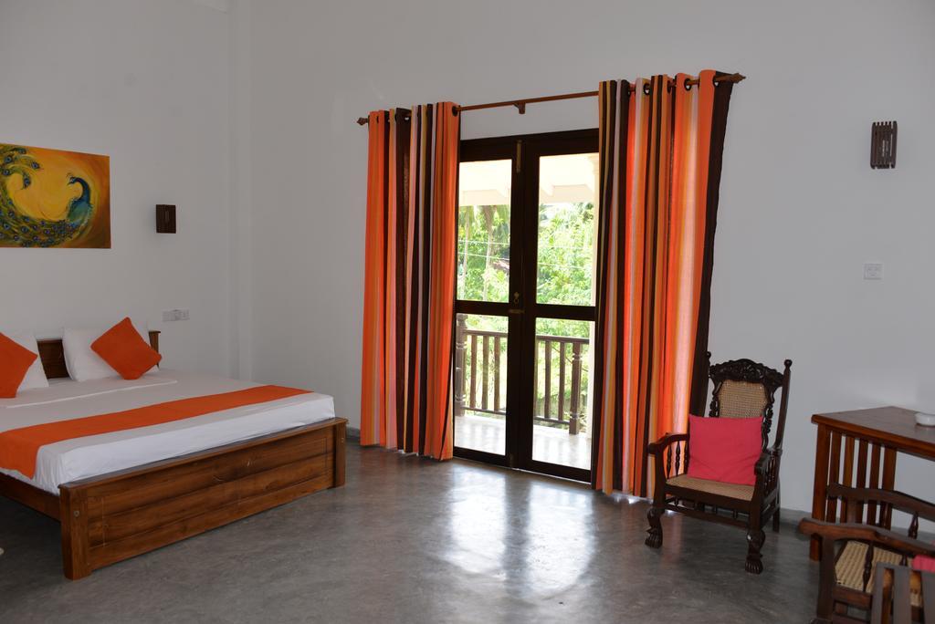 Santori Unawatuna Chambre photo